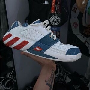adidas Blue and White Athletic Shoes with Red Accents